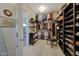 Bright walk-in closet with well-organized shelves and hanging racks for clothes and shoes at 20766 W White Rock Rd, Buckeye, AZ 85396