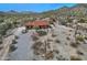 Expansive desert property with a charming home, desert landscaping, and mountain vistas at 30066 N Holly Dr, San Tan Valley, AZ 85144