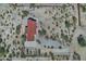A desert home featuring a red roof, a concrete driveway, and natural landscaping in a vast desert setting at 30066 N Holly Dr, San Tan Valley, AZ 85144