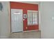 A classic entryway featuring tile floors and natural light from the window at 30066 N Holly Dr, San Tan Valley, AZ 85144