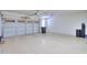 Large two car garage with painted floors and ample room for storage and vehicles at 325 W Seaside Dr, Casa Grande, AZ 85122