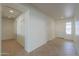 Hallway featuring tile flooring, white walls, and recessed lighting at 325 W Seaside Dr, Casa Grande, AZ 85122