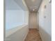 Hallway featuring tile flooring, white walls, and recessed lighting at 325 W Seaside Dr, Casa Grande, AZ 85122