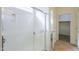 Bathroom shower with tile surround and clear glass door at 325 W Seaside Dr, Casa Grande, AZ 85122