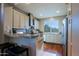 Modern kitchen with granite countertops, stainless steel appliances, and ample cabinet space at 32960 N 70Th St, Scottsdale, AZ 85266