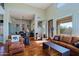 Bright living room features hardwood floors, an open layout, and ample seating at 32960 N 70Th St, Scottsdale, AZ 85266