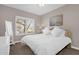 Cozy bedroom with plantation shutters, large bed, and plush carpet at 33250 N 71St St, Scottsdale, AZ 85266