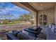 Relaxing outdoor living space with a covered patio and picturesque desert views at 33250 N 71St St, Scottsdale, AZ 85266