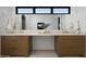 Elegant bathroom with double vanities, modern fixtures, and plenty of counter space at 3634 N 47Th St, Phoenix, AZ 85018