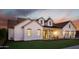 Stunning home exterior featuring an arched entryway and a well-maintained lawn at 3634 N 47Th St, Phoenix, AZ 85018