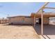 Spacious backyard with covered patio and a lot of potential for landscaping and outdoor activities at 3644 W Townley Ave, Phoenix, AZ 85051