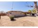 Expansive backyard view, perfect for outdoor activities, featuring a covered patio area at 3644 W Townley Ave, Phoenix, AZ 85051