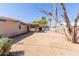 Large backyard with a covered patio, offering great potential for outdoor living and entertainment at 3644 W Townley Ave, Phoenix, AZ 85051