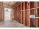 Unfinished garage with exposed framing presents a blank canvas for customization at 3644 W Townley Ave, Phoenix, AZ 85051