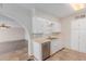 View of eat-in kitchen showing stainless dishwasher at 3644 W Townley Ave, Phoenix, AZ 85051