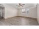 Bright living room featuring modern flooring, natural light, and neutral walls at 3644 W Townley Ave, Phoenix, AZ 85051