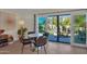 Bright dining area features patio access and backyard view at 4114 E Desert Cove Ave, Phoenix, AZ 85028