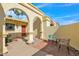Inviting front entrance features a cozy seating area and stucco arches at 4114 E Desert Cove Ave, Phoenix, AZ 85028