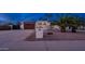 Exterior home view showcasing a circular driveway and a spanish style roof at 4114 E Desert Cove Ave, Phoenix, AZ 85028