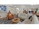 Bright living room features an open floor plan and stylish furnishings at 4114 E Desert Cove Ave, Phoenix, AZ 85028