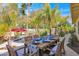 Outdoor dining area featuring a table set for a meal and seating with backyard pool nearby at 4114 E Desert Cove Ave, Phoenix, AZ 85028