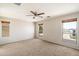 Carpeted bedroom with large windows providing ample natural light at 4691 E Torrey Pines Ln, Chandler, AZ 85249