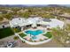 Breathtaking aerial view of a modern home with a sparkling pool, spa, and outdoor living space at 5045 E Calle Del Sol --, Cave Creek, AZ 85331