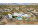 Stunning aerial shot showcasing a luxury home with a pool, outdoor fire pit, and beautiful desert surroundings at 5045 E Calle Del Sol --, Cave Creek, AZ 85331