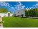 Green backyard featuring a manicured lawn and privacy wall at 5045 E Calle Del Sol --, Cave Creek, AZ 85331