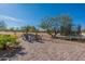 Spacious brick patio with outdoor seating, a trampoline, and desert landscaping at 5045 E Calle Del Sol --, Cave Creek, AZ 85331