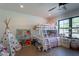 Playful bedroom featuring bunkbeds, a teepee, and a bright window with natural light at 5045 E Calle Del Sol --, Cave Creek, AZ 85331
