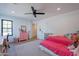 Inviting bedroom featuring a double bed, natural lighting, and a ceiling fan at 5045 E Calle Del Sol --, Cave Creek, AZ 85331