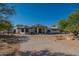 Home's exterior elevation with desert landscaping at 5045 E Calle Del Sol --, Cave Creek, AZ 85331