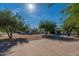Home exterior with a view of a paved driveway and desert landscaping at 5045 E Calle Del Sol --, Cave Creek, AZ 85331