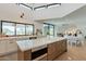 Open kitchen featuring an island and eat-in dining with natural light and backyard views at 5045 E Calle Del Sol --, Cave Creek, AZ 85331