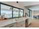 Kitchen featuring large sink and ample countertop space with views to the outdoor pool area at 5045 E Calle Del Sol --, Cave Creek, AZ 85331