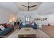 Spacious living room with vaulted ceilings, statement ceiling fan, wet bar and views to the exterior at 5045 E Calle Del Sol --, Cave Creek, AZ 85331