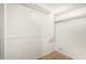 Walk-in closet with multiple rods for hanging clothing and some lower shelving at 5303 N 7Th St # 242, Phoenix, AZ 85014