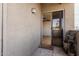 Exterior entryway with sliding glass door, doormat, and room for plants at 5303 N 7Th St # 242, Phoenix, AZ 85014