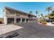 Exterior view of garages showcasing the architecture, with access to residences above at 5303 N 7Th St # 242, Phoenix, AZ 85014
