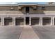 Row of private garages below residential units, offering covered parking and convenience at 5303 N 7Th St # 242, Phoenix, AZ 85014
