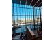 Bright interior space featuring soaring ceilings and large windows, with views of the parking lot at 5303 N 7Th St # 242, Phoenix, AZ 85014