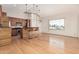 Modern kitchen featuring sleek appliances, granite countertops, wooden accents, and ample natural light at 5303 N 7Th St # 242, Phoenix, AZ 85014