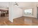 Inviting living space with light wood floors, a large window, and an open-concept design at 5303 N 7Th St # 242, Phoenix, AZ 85014