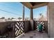 View from patio with decorative railing, desert landscaping, and partial shade at 5303 N 7Th St # 242, Phoenix, AZ 85014