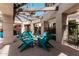 Community outdoor patio with comfortable seating and shaded pergola area at 5303 N 7Th St # 242, Phoenix, AZ 85014