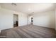 Neutral bedroom with ensuite bathroom, large closet and carpeted floors at 611 W Crowned Dove Trl, Casa Grande, AZ 85122
