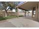 Covered patio area with outdoor seating overlooking the grassy yard at 628 W Mcnair St, Chandler, AZ 85225