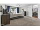 Bright main bedroom features a ceiling fan, closet and sliding glass door to the yard at 628 W Mcnair St, Chandler, AZ 85225