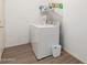 Laundry room with a washing machine and a dryer at 702 S 119Th Ave, Avondale, AZ 85323